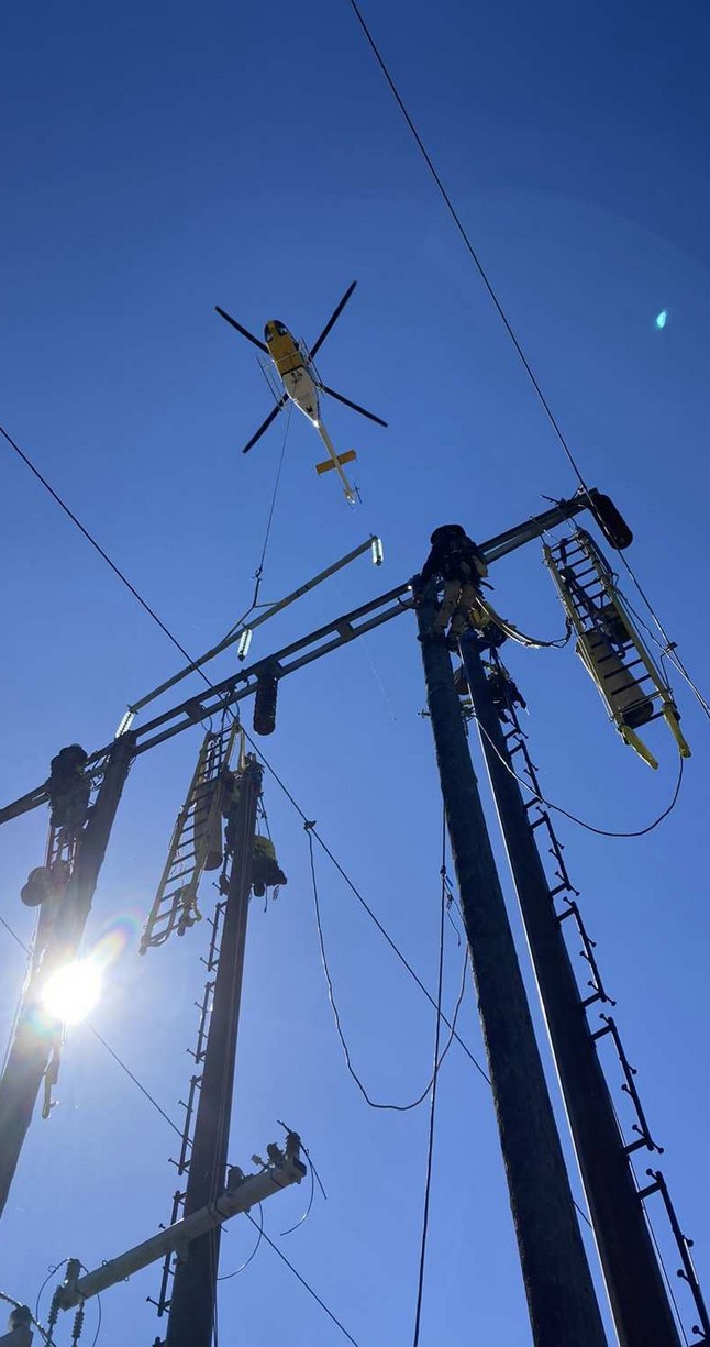 Helicopter transmission line work