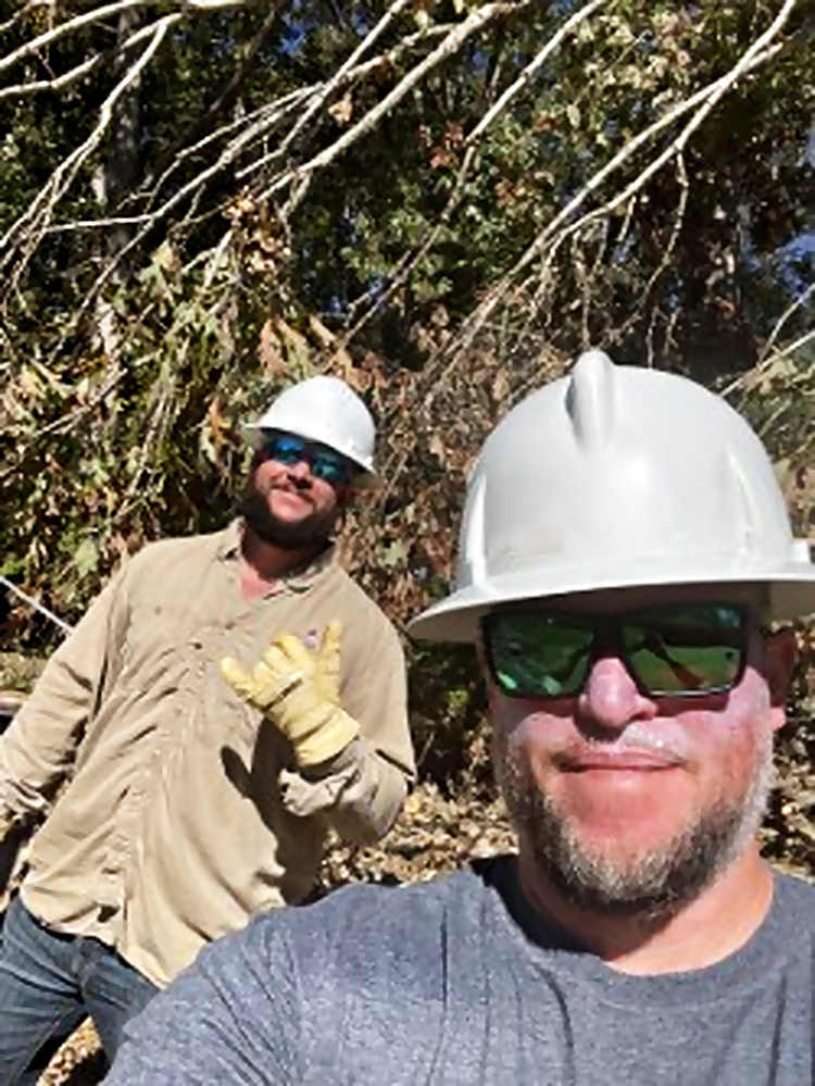 J&J Line Services crew on a storm response job site