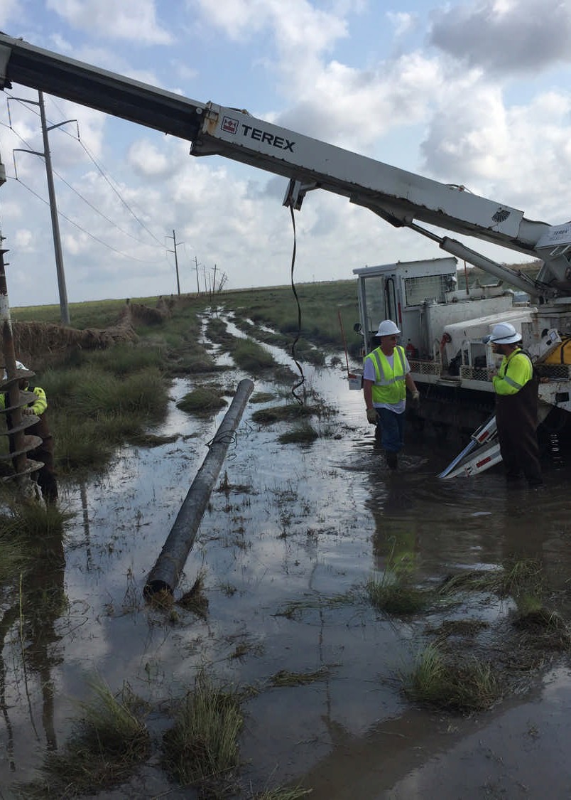 Storm response crew in flooded conditions