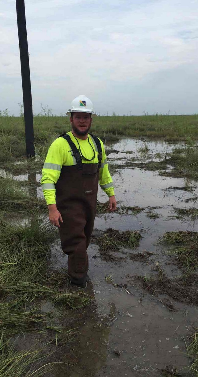 Lineman in storm response conditions